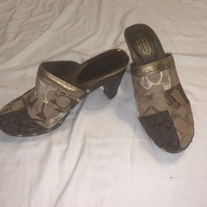 Vintage Coach clogs Size 7. Some wear n tear. Good condition. cloth & wood.